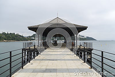 Blake Pier At Stanley. A public pier with a Classic Edwardian Style Iron Steel Roof in Stanley, Hong Kong Editorial Stock Photo