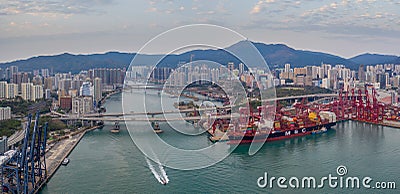 Hong Kong, China - 2020: Rambler Channel, bridges and ship with containers Editorial Stock Photo