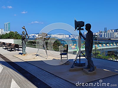 Hong Kong Cityscape Kowloon Tsim Sha Tsui Movie Set Shooting Entertainment Industry Camera Man Sculpture K11 Shopping Mall Outdoor Stock Photo