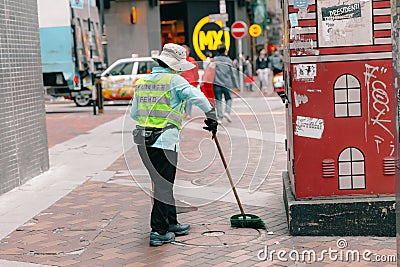 Hong Kong cleaning worker clean the street every morning Editorial Stock Photo