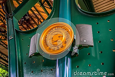 Hong Kong Disneyland label plate at train station in front of the theme park Editorial Stock Photo