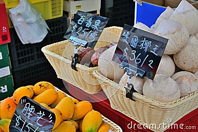 Hong Kong Market fruit young coconut price tag Editorial Stock Photo