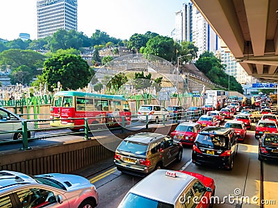 Red city taxis in road traffic, Hong Kong Editorial Stock Photo