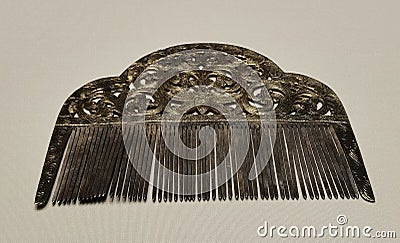 Hong Kong Palace Museum Antique Tang Comb Butterflies Design Foilage Motif Gilt Silver Accessory Stock Photo