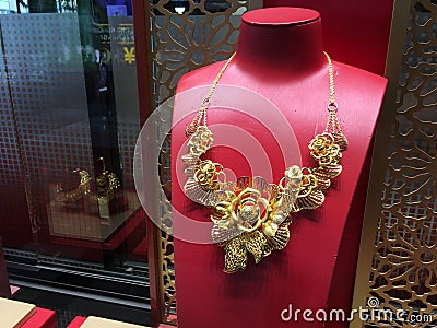 Gold necklace at Chow Tai Fook store, Hong Kong Editorial Stock Photo