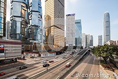Car, bus and taxi traffic on inner city highway in HongKong business district, Central Editorial Stock Photo