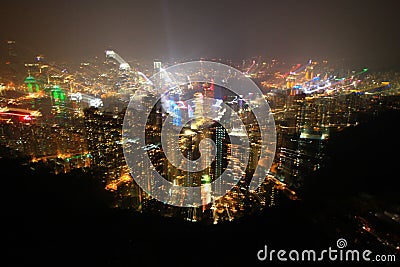 Hongkong island night time fulfill with light taking while exploding zoom len Stock Photo