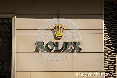 The Rolex logo signage on shop facade in Hongkong Editorial Stock Photo