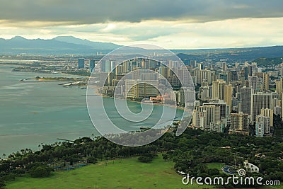 Honolulu city and Wikiki beach under heavy clouds Stock Photo