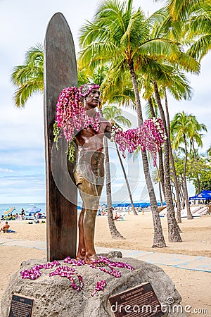 Duke Kahanamoku statue in front of Kuhio Beach Park Editorial Stock Photo