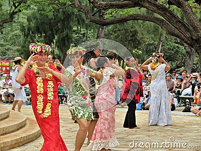 Honolulu, Hawaii - 5/2/2018 - Senior Hawaiian woman performing traditional hula dance Editorial Stock Photo