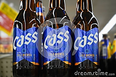 Korean beer brand Cass Fresh Cold Brewed bottles with blue labels imported to the United States. Editorial Stock Photo
