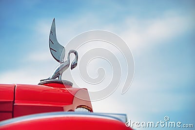 Hood ornament of a red 1936 Packard Editorial Stock Photo