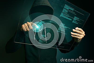 Hooded computer hacker hacking biometric security internet system Stock Photo