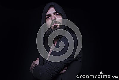 Hooded dark man Stock Photo