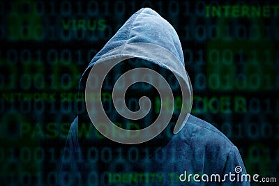 Hooded silhouette of a hacker Stock Photo
