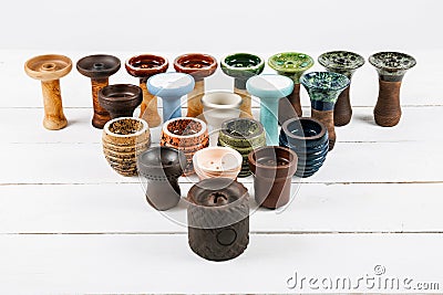 Hookah bowls on a white wooden background Stock Photo