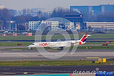 Hop! jet taxiing at Amsterdam Editorial Stock Photo