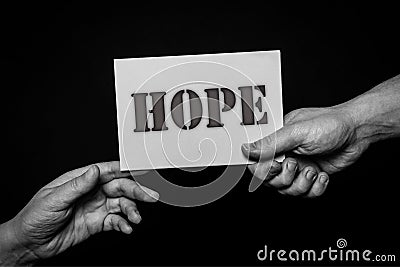 Hope, helping hands concept, offering care, love, hope and support. Stock Photo