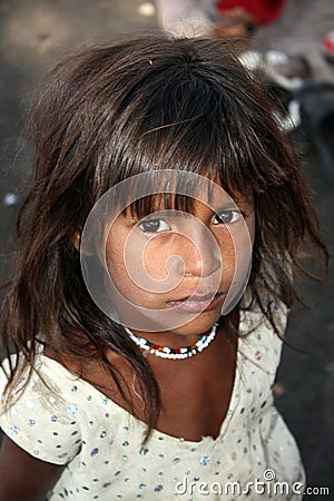 Hopeful Poor Indian Girl Stock Photo