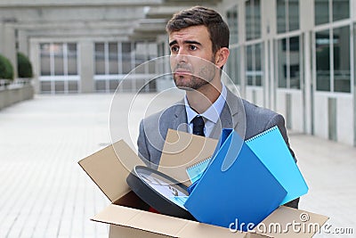 Hopeless businessman getting fired isolated Stock Photo