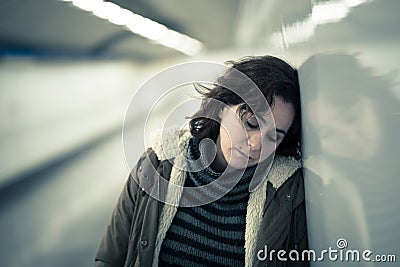 Unhappy young woman feeling sad and stressed suffering from depr Stock Photo