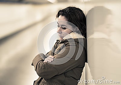 Unhappy young woman feeling sad and stressed suffering from depr Stock Photo