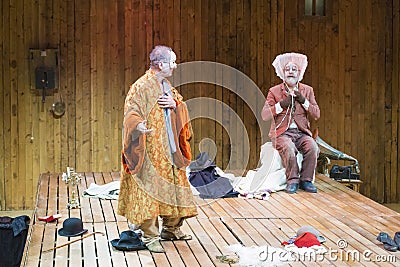 Actors on stage during a theatre play Stock Photo