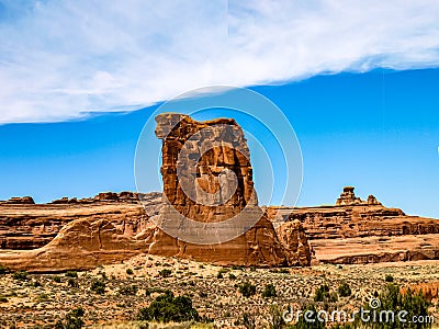 The horizon filled with giant red rocks standing on folded rocks, Arches National Park, UT, USA Stock Photo