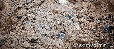 Horizontal background of industrial sand with stones Stock Photo