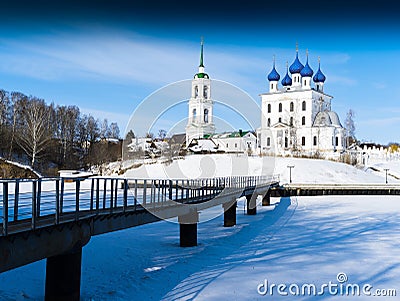 Horizontal bridge to orthodox winter temple background Stock Photo