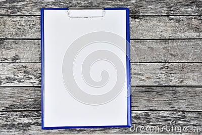 Horizontal clipboard with blank white paper on wooden Stock Photo