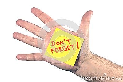 Horizontal DON'T FORGET Note On Hand Stock Photo