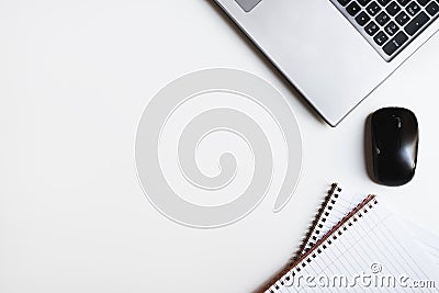 Horizontal flat lay with laptop keyboard, computer mouse and notebooks Stock Photo