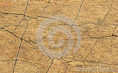 A horizontal frame of cracked rock texture natural background. Stock Photo