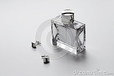 Horizontal mens cologne and cufflinks Stock Photo