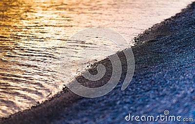 Horizontal pebble beach sunset landscape Stock Photo