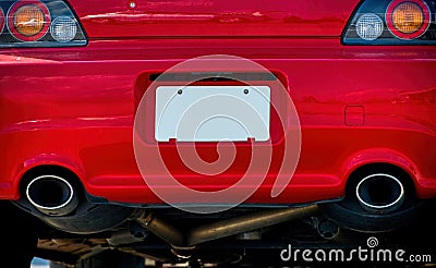 Blank White License Plate On Red Car Bumper REVISED Stock Photo