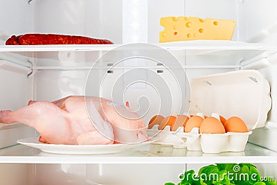 Horizontal shot shelves of the refrigerator with food Stock Photo