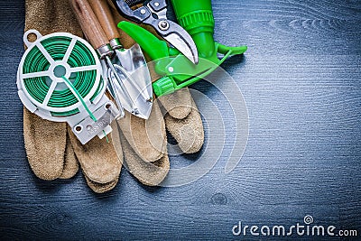 Horizontal version green wire glove fork spade secateurs sprayer Stock Photo