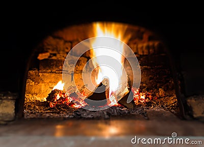 Horizontal vibrant fire in stove bokeh background backdrop Stock Photo