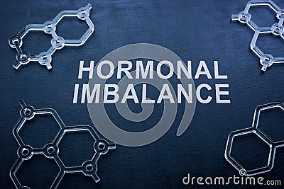 Hormonal imbalance on the blackboard and chemical models. Stock Photo