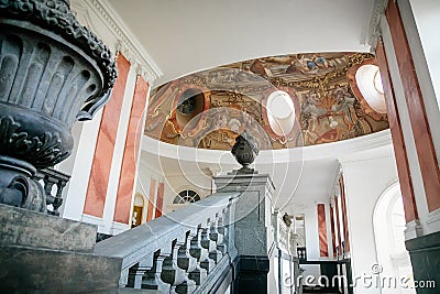 Horovice castle interior, Baroque chateau, Large bright hall of the castle with marble staircase and frescoes on the ceiling, Editorial Stock Photo