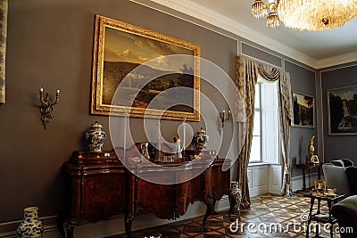 Horovice castle interior, Baroque chateau, wooden chest of drawers, vintage Chinese porcelain vases, paintings in gilded frames, Editorial Stock Photo