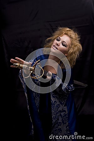 Horrible witch die of sword Stock Photo