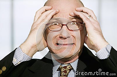 Horrified Businessman Stock Photo