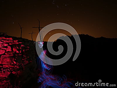 Horror clown with light painting technique Stock Photo