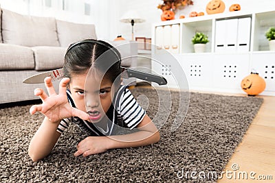 Horror girl plays the killing game Stock Photo