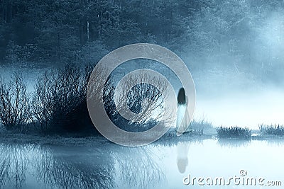 Mysterious Woman in the Mist Stock Photo
