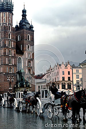Horse carriages and Santa Maria Basilica Editorial Stock Photo